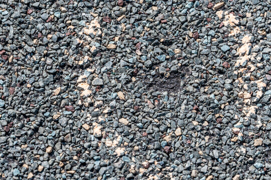 Macro Of Hail Damage On A Shingle Residential Roof Circled With A Chalk Outline During A Home Inspection.