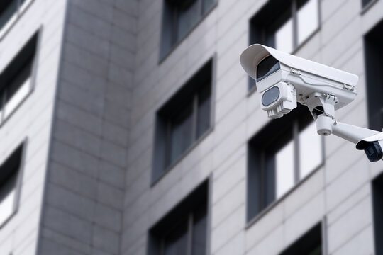 Security CCTV camera or surveillance system in office building.