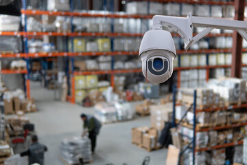closed circuit camera Multi-angle CCTV system against the background of a modern warehouse complex....
