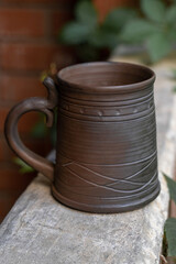       Ceramics, a ceramic product made with your own hands, made on a potter's wheel, a jug, a mug, clay. 