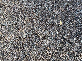 Stone pebbles on the floor.