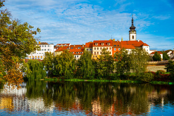 Obraz premium Old stone houses on the embankment of the Otava River. Czech Republic