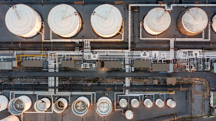Aerial top view oil storage tank and pipeline at petrol industrial zone, Oil refinery plant...