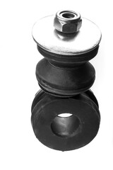 black metal part with rubber bushings for the car, as well as other suspension elements. white background.