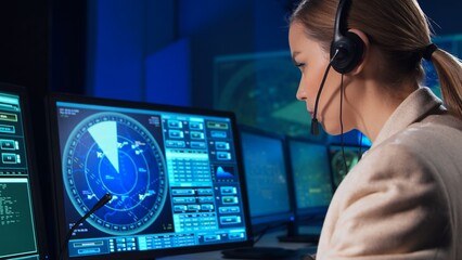 Workplace of the air traffic controllers in the control tower. Team of professional aircraft control officers works using radar, computer navigation and digital maps. Aviation concept.