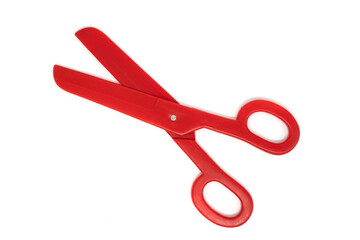 Photo of red scissors isolated white background