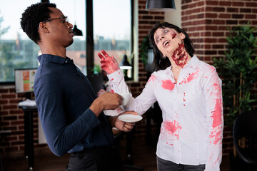 Aggressive zombie chatting with man in office, brain eating monster with bloody scars and ugly...