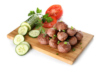 Wooden board with tasty meat balls and vegetables on white background