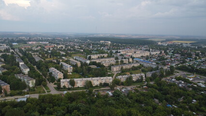 Aerial photography. Top view of a provincial town. Area with multi-storey buildings.