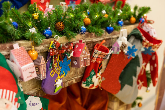 Christmas decoration stocking and toys hanging over rustic wooden background