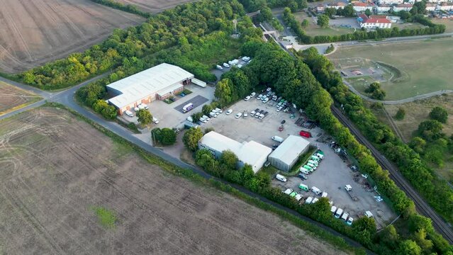 Aerial fly around of a small industrial estate