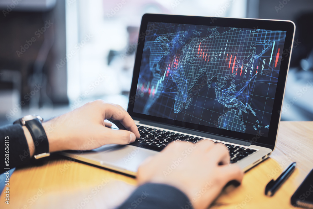 Poster close up of male hands using laptop keyboard with creative forex grid map on blurry background. trad
