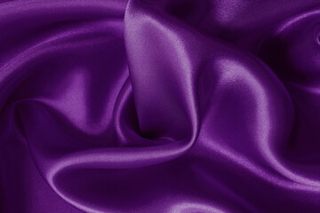 Purple fabric cloth texture for background and design art work, beautiful crumpled pattern of silk or linen.