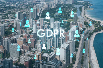Aerial panorama city of Chicago downtown area and Lake, day time, Illinois, USA. Birds eye view, skyscrapers. GDPR hologram, concept of data protection regulation and privacy for all individuals