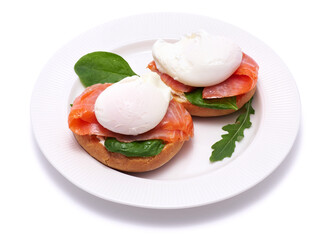 Cream cheese, Smoked salmon and poached egg toasts on a plate