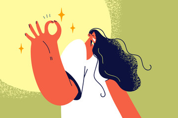 Smiling woman show ok hand gesture 