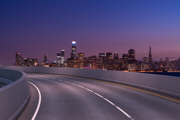 Obraz premium Empty urban asphalt road exterior with city buildings background. New modern highway concrete construction. Concept way to success. Transportation logistic industry fast delivery. San Francisco. USA.