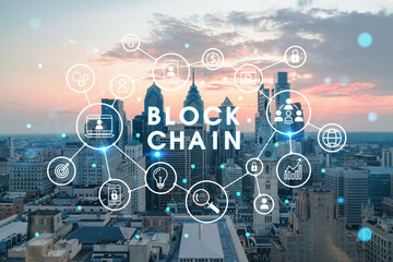 Aerial panoramic skyline of Philadelphia financial downtown, Pennsylvania, USA. City Hall Clock Tower at sunset. Decentralized economy. Blockchain, cryptocurrency and cryptography concept, hologram