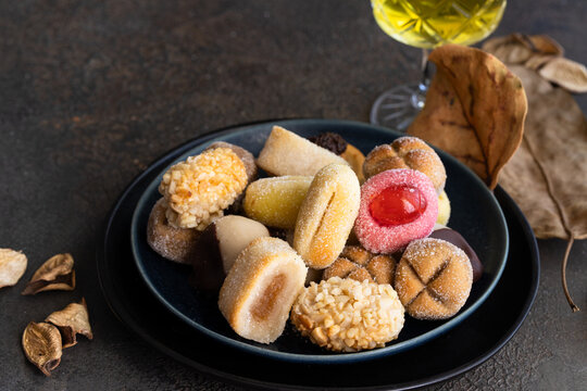 Panellets, typical cookies from Catalu&ntilde;a, prepared for Dia de Todos Los Santos or All Saints Day and traditionally served with sweet wine.