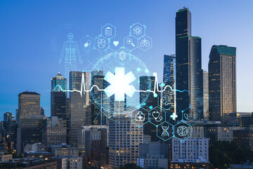 Illuminated aerial cityscape of Seattle, downtown at night time, Washington, USA. Health care digital medicine hologram. The concept of treatment and disease prevention