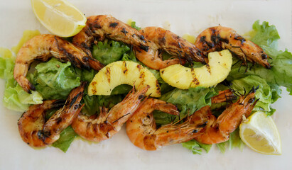 Grilled pineapple snd shrimp salad with citrus dressing - delicious salad full of nutrients and minerals that can be served on the side or as a main dish.