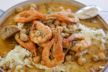Prawns with chick peas and garlic in white cod roe.	