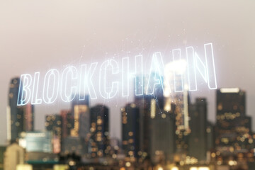 Double exposure of abstract virtual blockchain technology hologram on blurry cityscape background. Research and development decentralization software concept