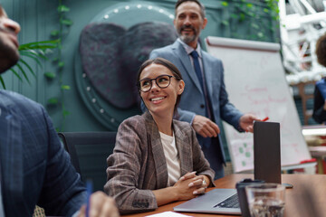 A group of business people partners during a set team meeting in the modern office