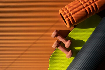 sports equipment bright orange and lemon color closeup horizontal top view space for printing