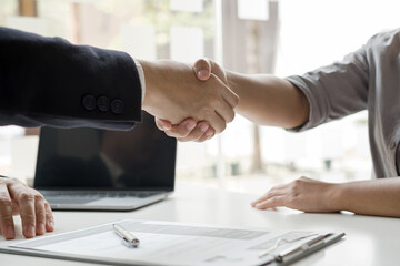 Employer shake hand with job applicants congratulates and welcomes new hires after successful...