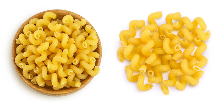 raw pasta cavatappi in wooden bowl isolated on white background with full depth of field. Top view. Flat lay