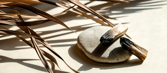 Palo Santo sticks on a light background.Aromatherapy religious rituals meditation.Wellness with...