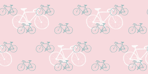 Doodle style seamless pink pattern with bicycles