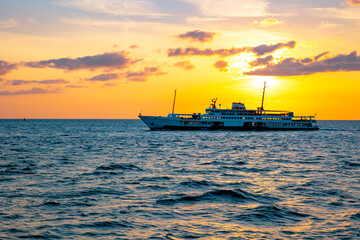 Famous ferry of Istanbul on the sea at sunset. Travel to Istanbul background