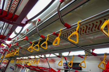 Handles for passengers. Hanging handle holders in transport. Transport handrail. Safety equipment...