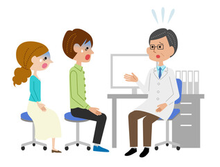 診察室で男性医師に説明を受けてショックを受ける若い夫婦