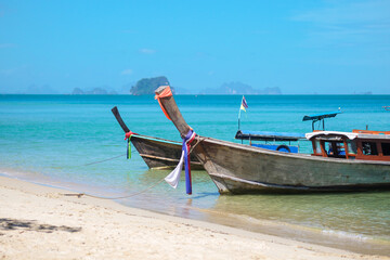 Fototapeta na wymiar longtail boat on Tubkaak beach ready to Hong island, Krabi, Thailand. landmark, destination Southeast Asia Travel, vacation and holiday concept