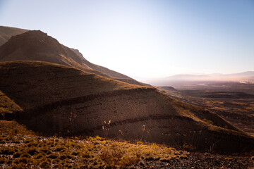 View over the desert from Mount Bruce at sunrise in the Karijini National Park, Western Australia