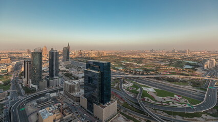 Fototapeta na wymiar Panorama showing Dubai marina and JLT skyscrapers along Sheikh Zayed Road aerial timelapse.