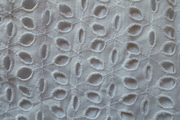 Surface of vintage white eyelet embroidery cotton fabric