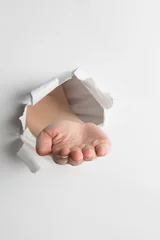 Rolgordijnen Hand presenting through paper © vectorfusionart