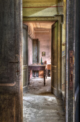 Italy, September 2022. Urbex. Corridor of an abandoned house, hdr.