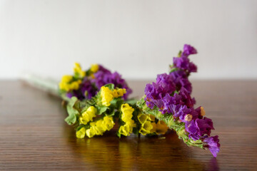 Dried flowers bouquet in the test tube. Copy space. Front view
