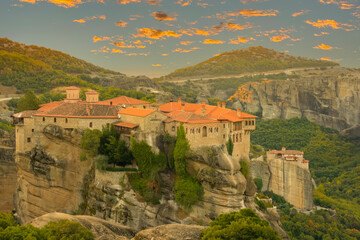 Obraz premium Sunset in the Summer Mountains and Rocky Abbey