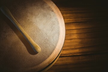 High angle view of bodhran with stick