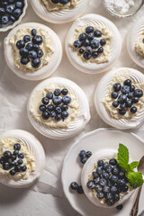 Homemade delicious mini Pavlova meringue made of fresh berries and mascarpone