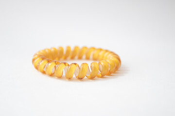 Yellow Rubber spiral Hair Band on white background