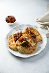 Homemade potato pancakes with red pesto