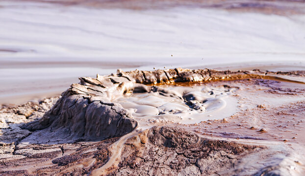 Mud geyser erupting at Takhti-Tepha place in the Vashlovani desert, Georgia.