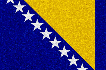 Flag of Bosnia and Herzegovina on styrofoam texture. national flag painted on the surface of plastic foam